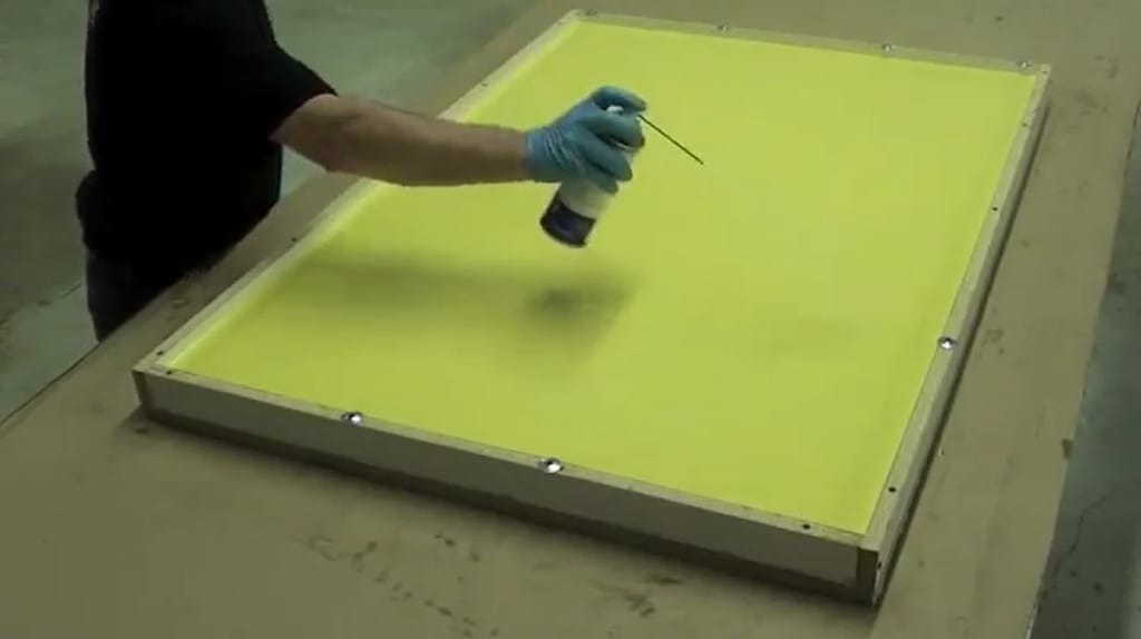 Spray releae agent onto freshly poured rubber to release air bubbles