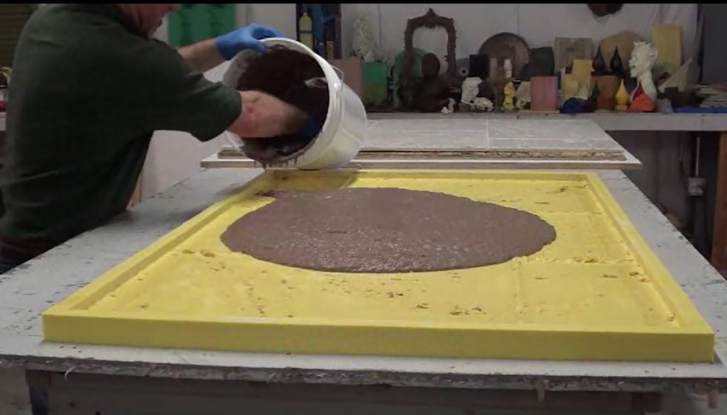 Pouring Concrete into Rubber Mold
