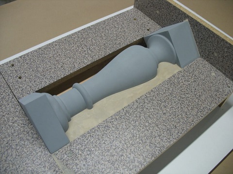 model embedded in clay mold making